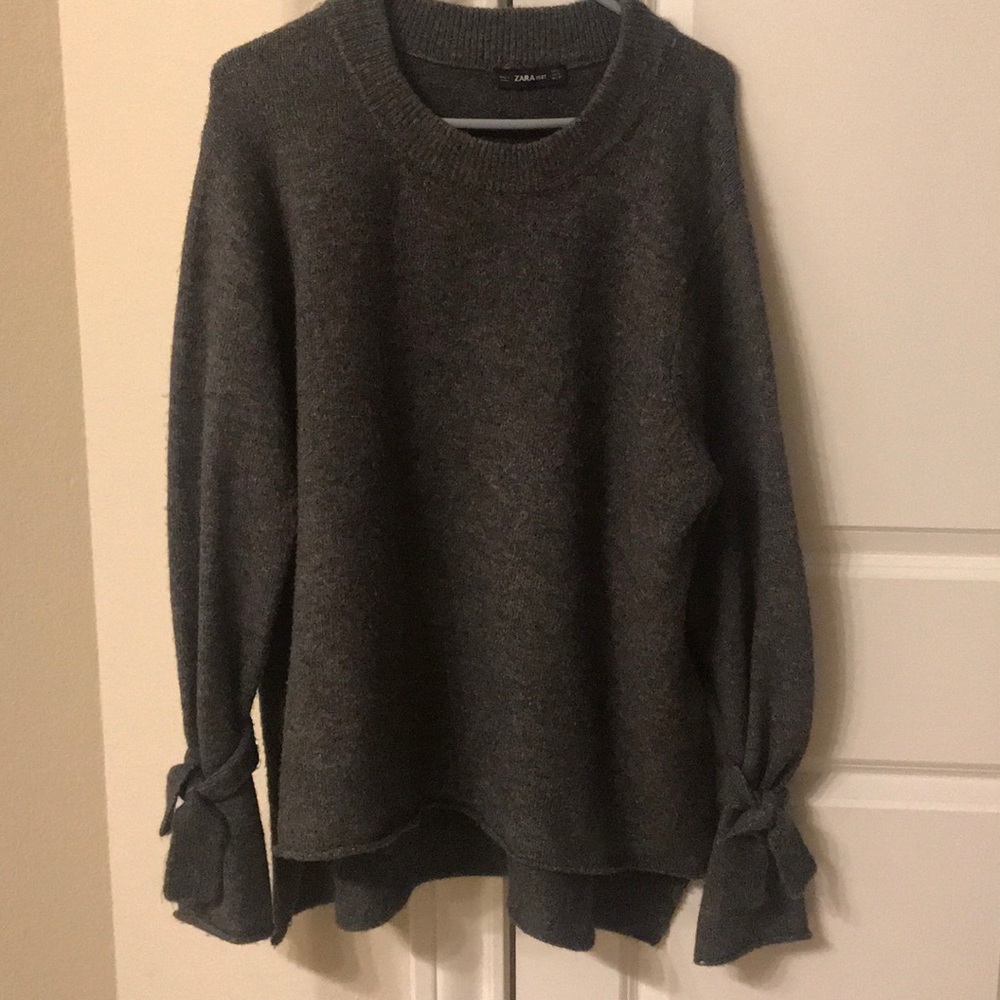Zara high-low sweater with tie sleeves.